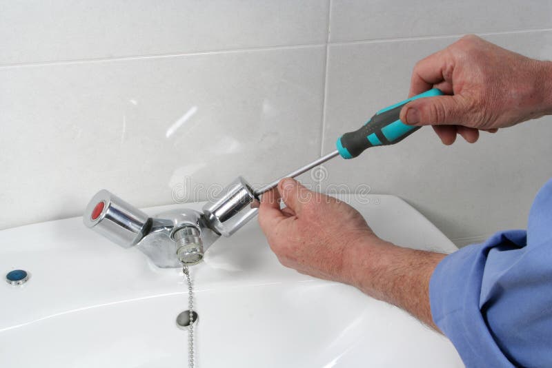 Repairing a Faucet in a Bathroom Stock Image Image of building