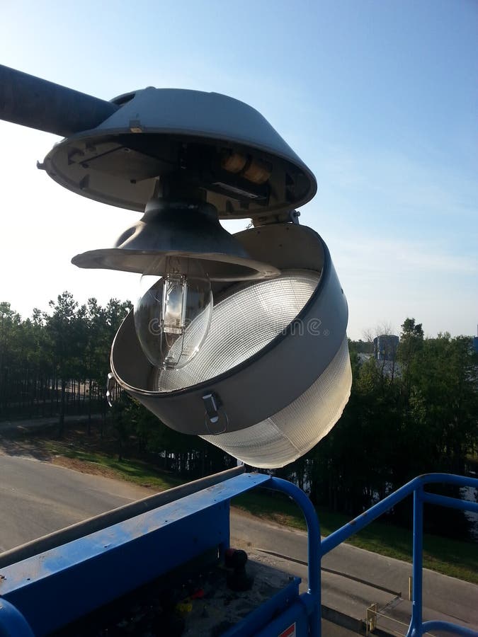 Repairing a Broken Street Light from a Manlift Stock Image Image of
