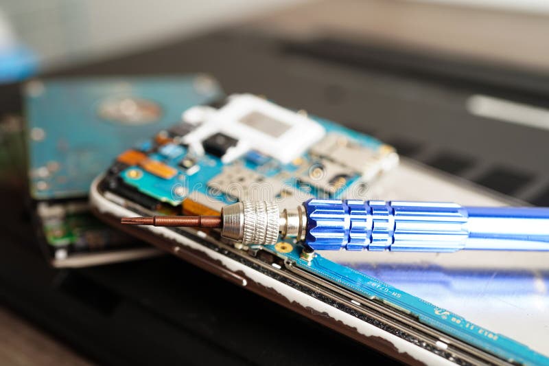 Repairing and upgrade mobile phone, electronic, computer hardware and technology concept royalty free stock images