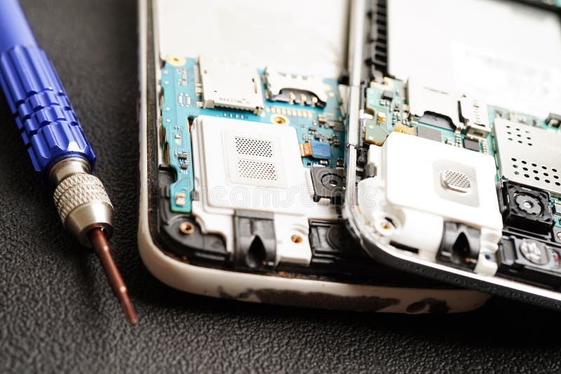 Repairing and upgrade mobile phone, electronic, computer hardware and technology concept royalty free stock image