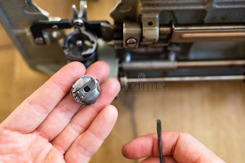 Repairman Master is Testing Old Disassembles Sewing Machine in