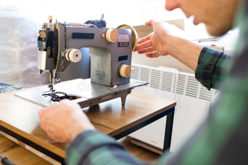 Repairman Master is Testing Old Disassembles Sewing Machine in