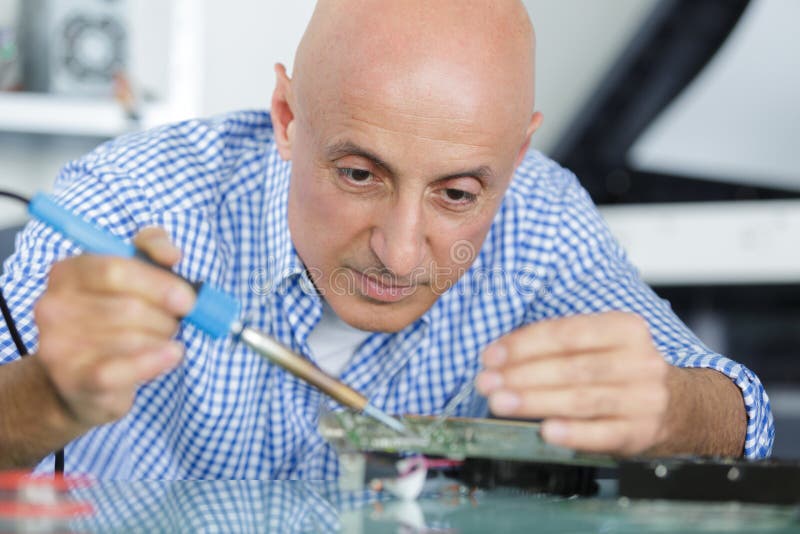 Repairman Working Soldering Pc Stock Image Image of support