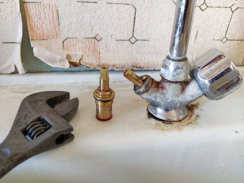 Repair of the old water tap on the kitchen. Repair of the old water tap on the kitchen