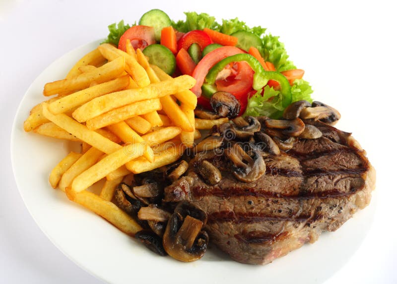 Repas de bifteck de Ribeye photographie stock libre de droits Repas de bifteck de Ribeye photographie stock libre de droits