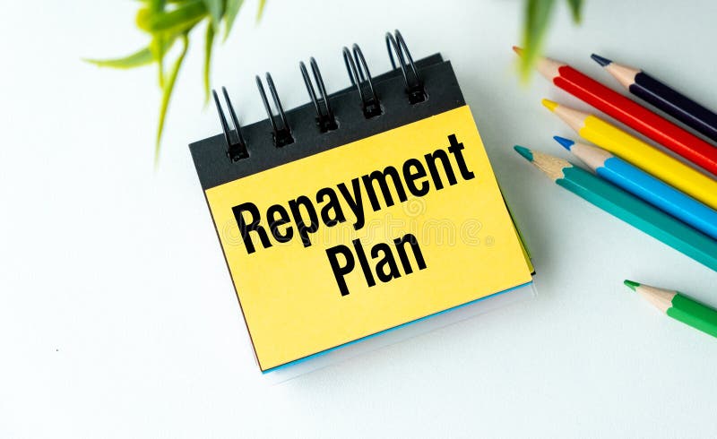 Repayment Plan text on notepad with colored pencils on office desk, Business Concept. Desk business concept stock images, royalty-free photos and pictures