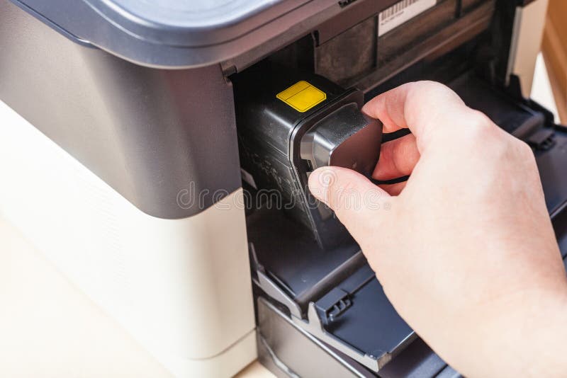 Replacement of cartridge in multi function device stock photography Replacement of cartridge in multi function device stock photography