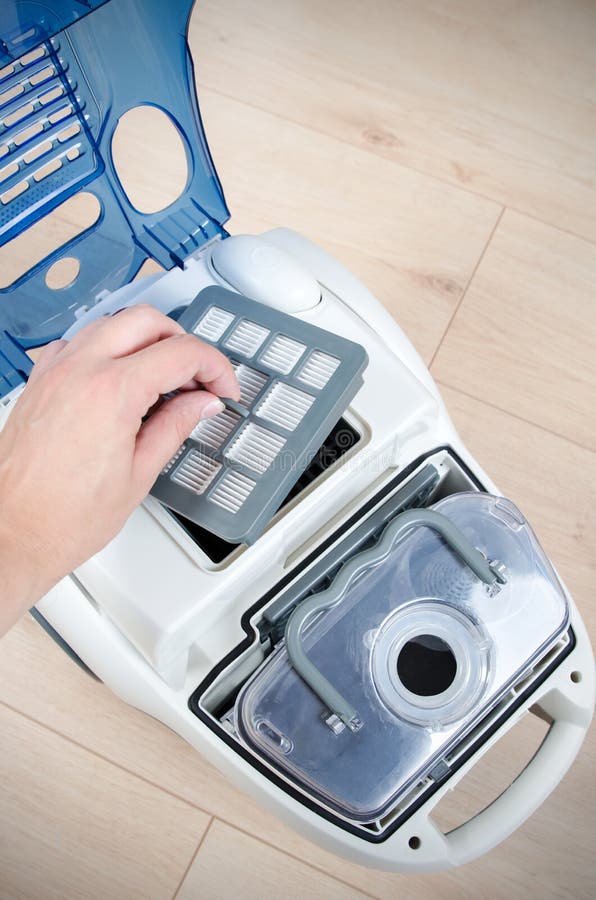 Replacing the Air Filter in a Modern Vacuum Cleaner Stock Photo Image