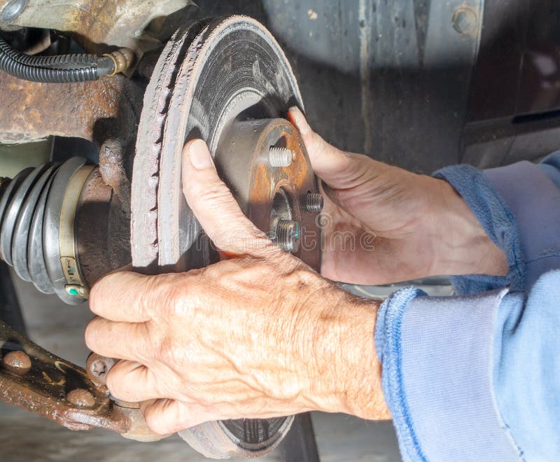 Removing brake disk rotor stock image. Image of front 174582929