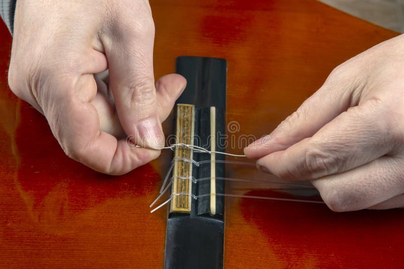Replacing and Tuning Nylon Strings on a Sixstring Classical Guitar