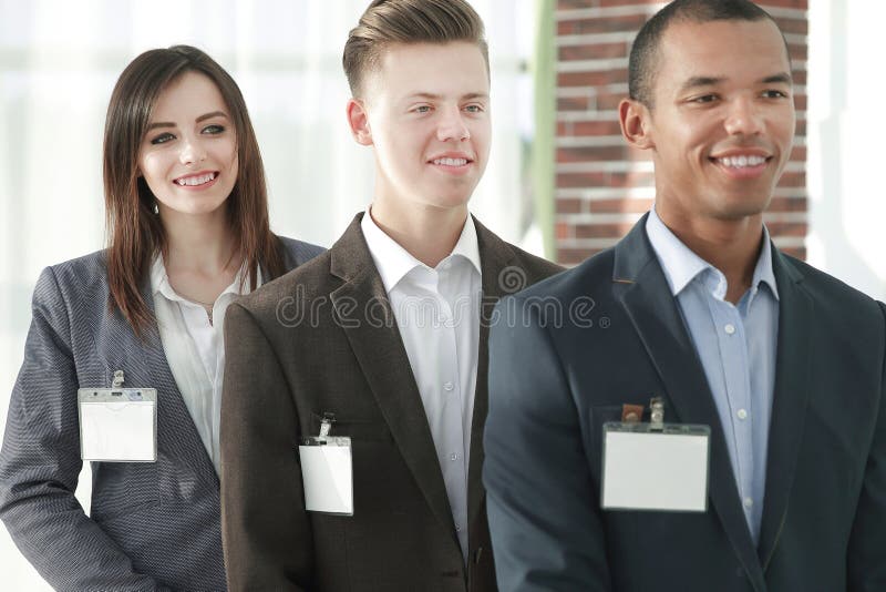 Reprezentanți ai echipei de afaceri de succes cu insigne necompletate. stock photography