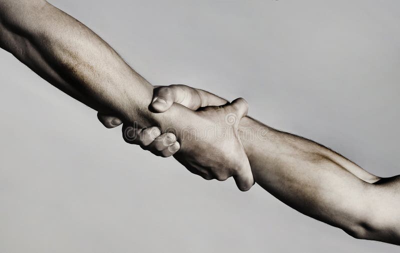 Rescue, helping gesture or hands. Strong hold. Two hands, helping hand of a friend. Handshake, arms, friendship