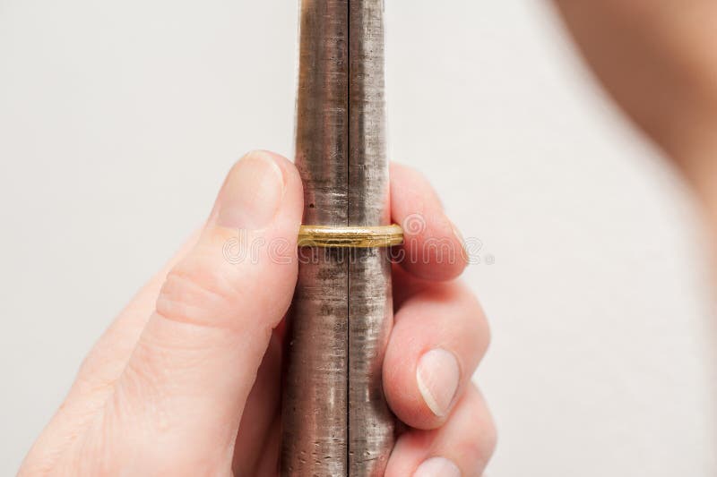 Resizing of wedding ring 1 stock image. Image of mechanics 32828591