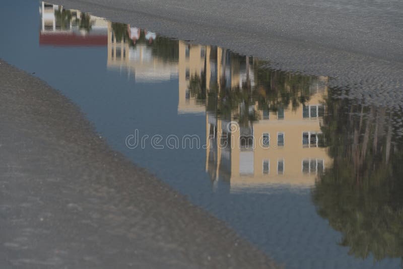 Resort Building Reflections in Tide Pond during Low Tide at Madeira