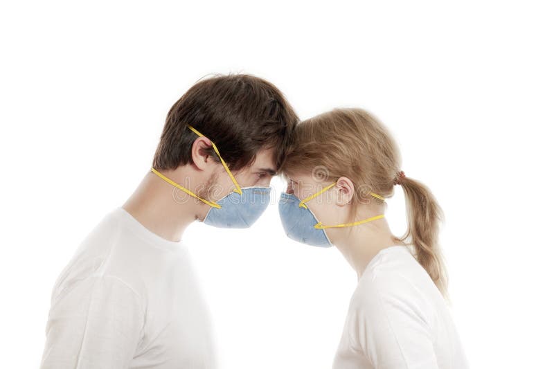 Respiratori da portare delle giovani coppie fotografia stock Respiratori da portare delle giovani coppie fotografia stock