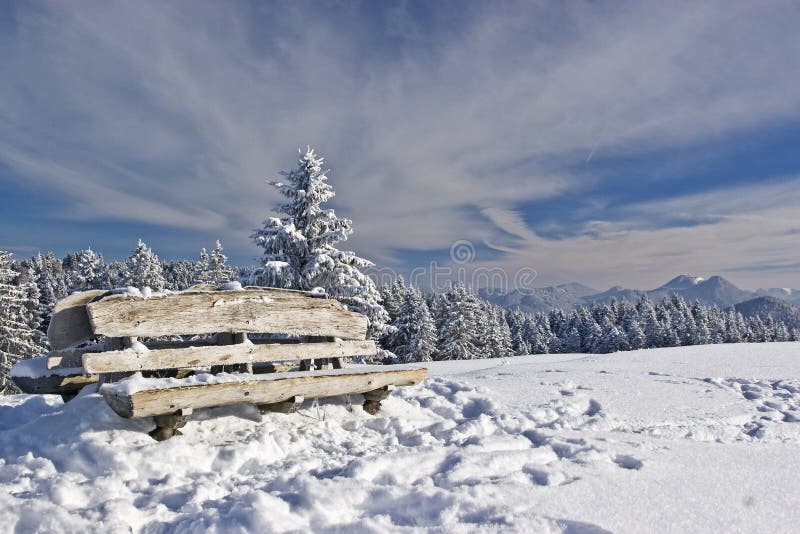 Rest bench in winter stock photo. Image of isarwinkel - 64829766