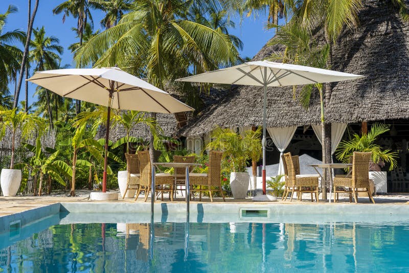 Rest zone near swimming pool on a tropical beach in Zanzibar island, Tanzania, Africa