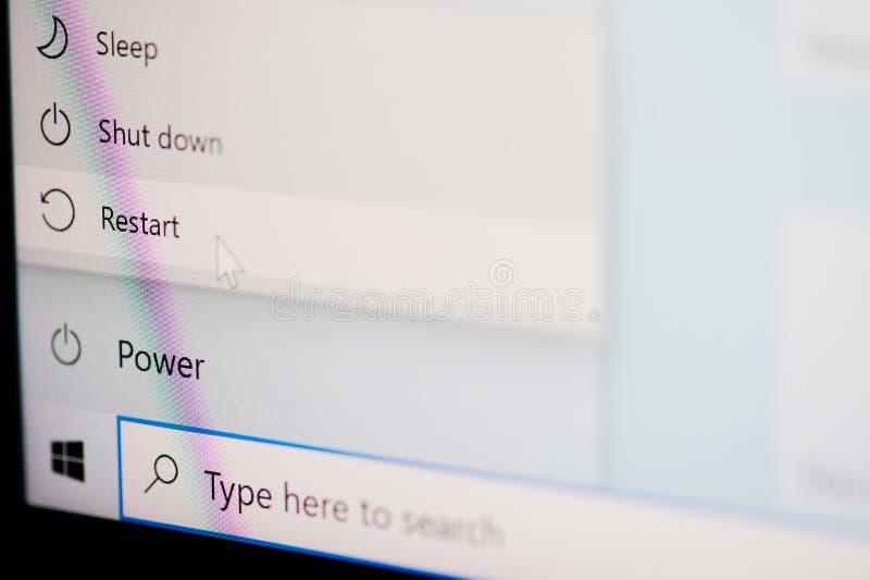 New york, USA - May 17, 2021: Restart button on windows os menu on screen macro close up view