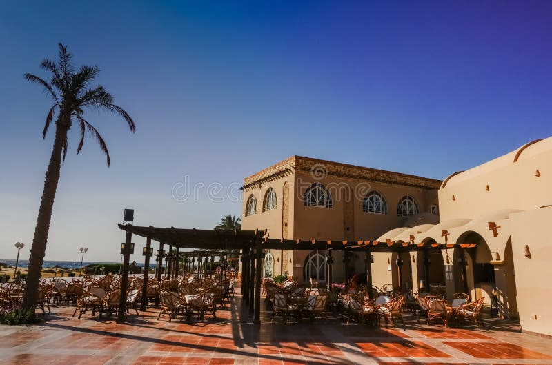 Restaurant Building with Palm Tree in a Resort at Vacation Stock Image