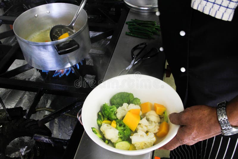 Restaurant Chef Dishing Up Fresh Vegetables Stock Photo Image of cook, food 22443946