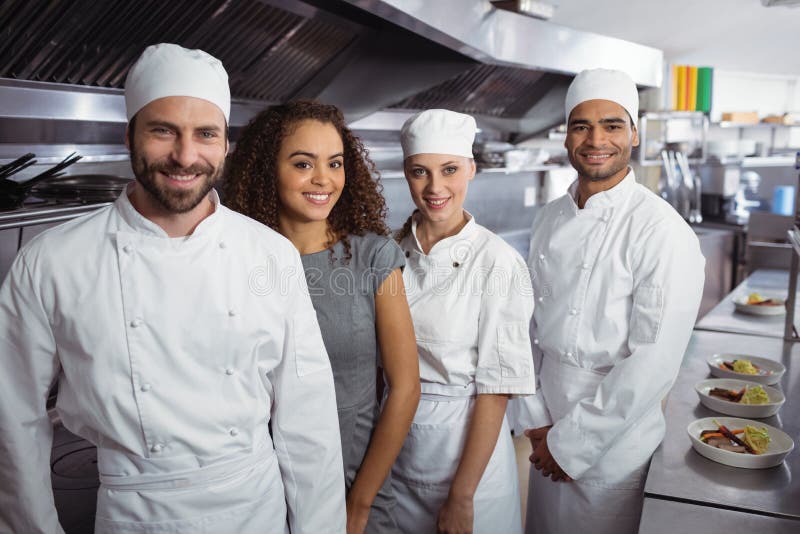 Restaurant Manager with His Kitchen Staff Stock Photo Image of