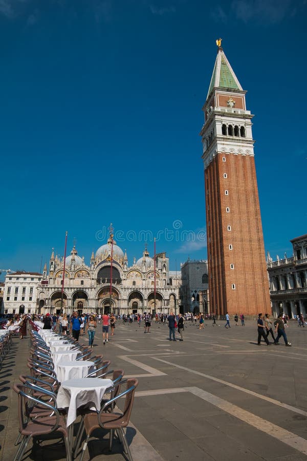 Restaurant in St Mark`s Square Piazza San Marco and church, Venice