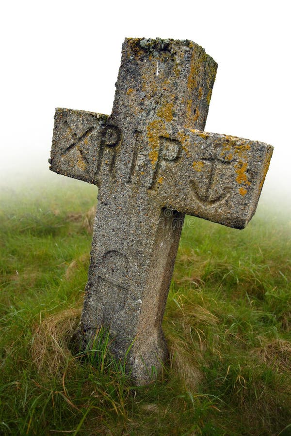 Gravestone with the initials RIP carved into it. Ancient gravesite in South Uist, Scotland. Gravestone with the initials RIP carved into it. Ancient gravesite in South Uist, Scotland.