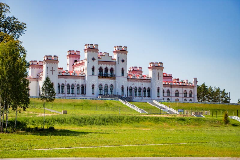 Restoration of an old medieval castle. Beautiful facade of the palace in Kossovo, Brest region, Belarus. Summer landscape