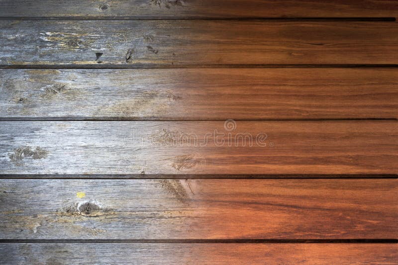 A wood panel that goes from old and worn to new and varnished. Regenerate stock images, royalty-free photos and pictures
