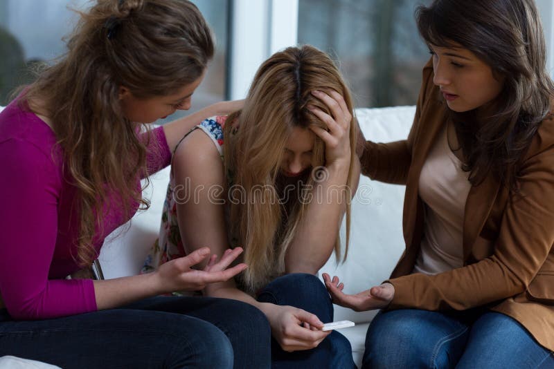 Teenage girls waiting for pregnancy test outcome. Teenage girls waiting for pregnancy test outcome