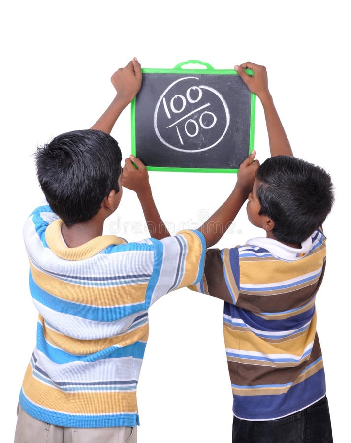 Young boys holding the slate showing hundred marks - clipping path included. Young boys holding the slate showing hundred marks - clipping path included