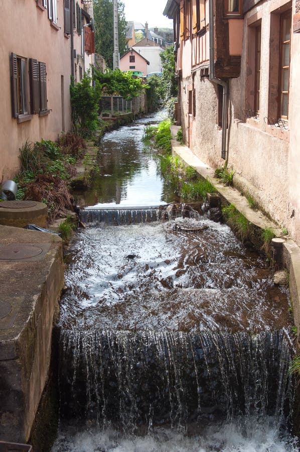 little channel in traditional alsatian village of Barr stock photo little channel in traditional alsatian village of Barr stock photo