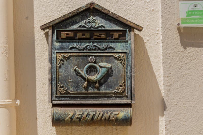Rethymno, Greece - July 30, 2016: The old mailbox. Rethymno is a city of approximately 40,000 people in Greece, the capital of Rethymno regional unit on the island of Crete. Rethymno, Greece - July 30, 2016: The old mailbox. Rethymno is a city of approximately 40,000 people in Greece, the capital of Rethymno regional unit on the island of Crete.