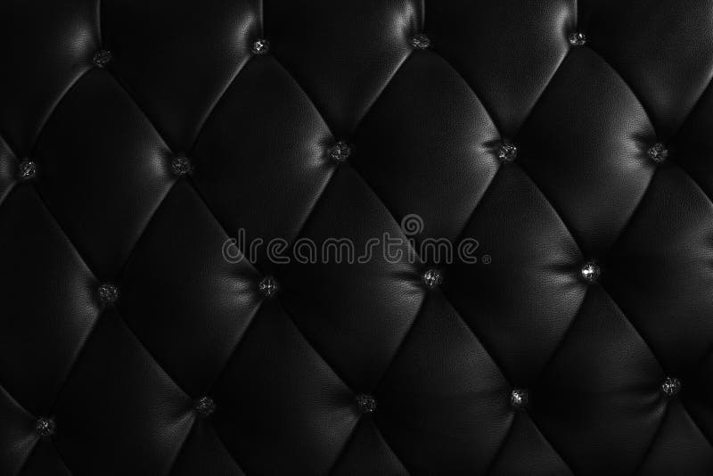 Reticolo di cuoio nero con il cristallo decorato fotografia stock Reticolo di cuoio nero con il cristallo decorato fotografia stock