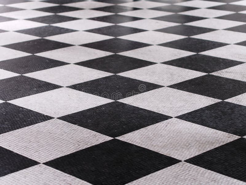 Reticolo di marmo checkered in bianco e nero del pavimento