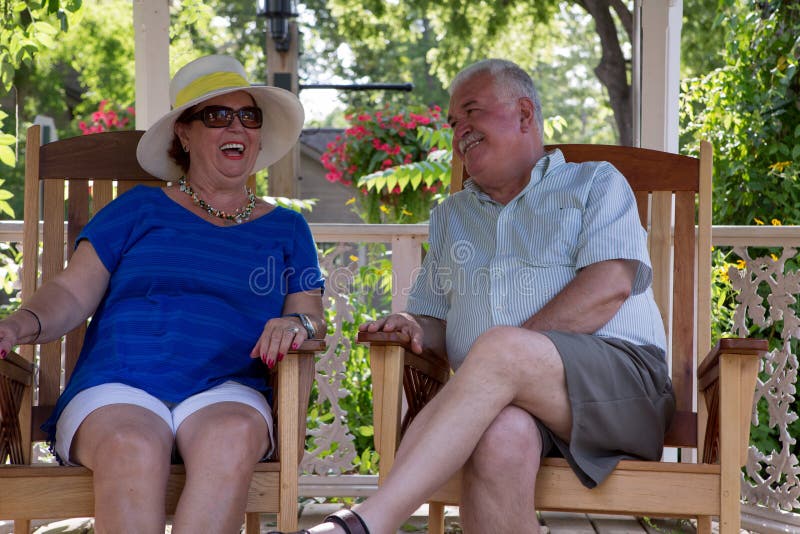 Retired Couple Having Fun Conversations