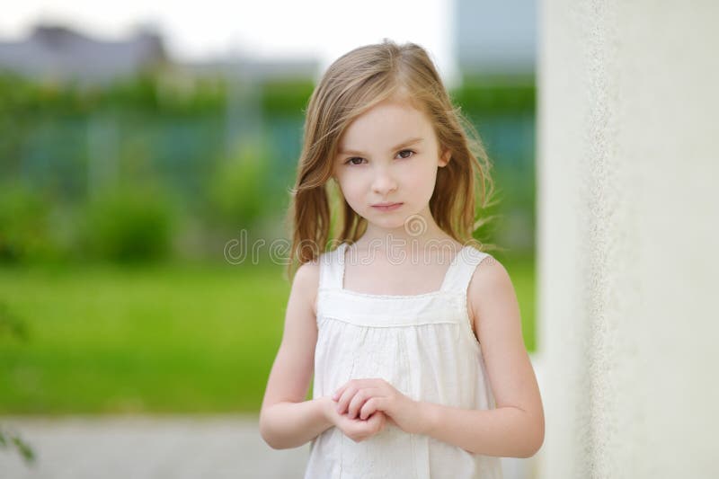 Adorable preschooler girl portrait outdoors at summer. Adorable preschooler girl portrait outdoors at summer