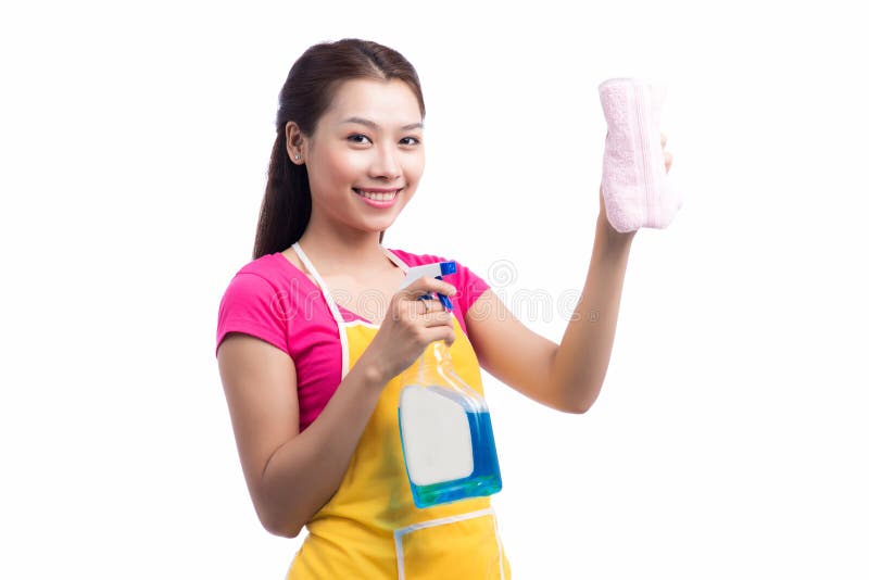 Retrato da esponja asiática nova feliz de Cleaning Glass With da empregada doméstica foto de stock royalty free Retrato da esponja asiática nova feliz de Cleaning Glass With da empregada doméstica foto de stock royalty free