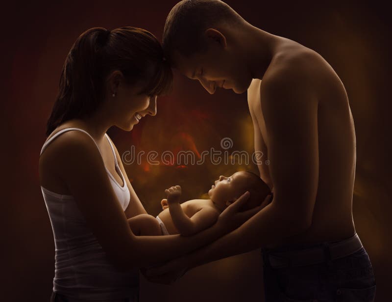 Family Portrait and Baby, Young Mother Father Holding New Born Kid on Hands, Happy Parents and Child. Family Portrait and Baby, Young Mother Father Holding New Born Kid on Hands, Happy Parents and Child