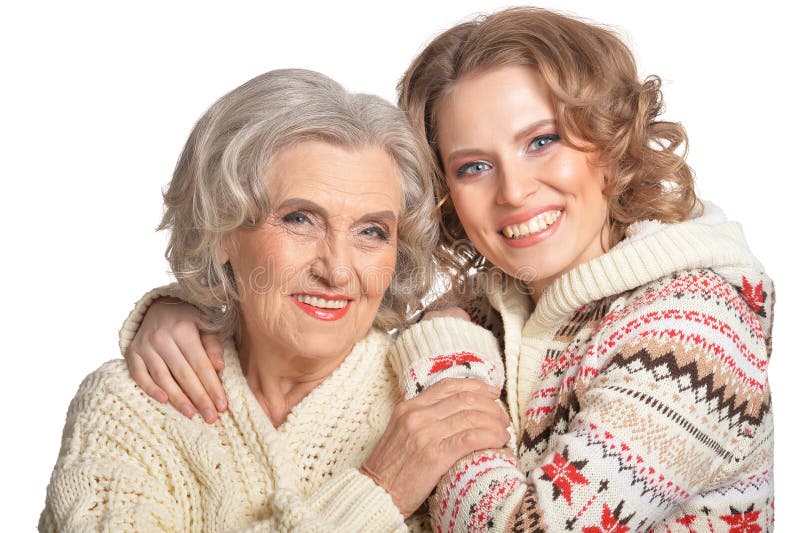 Retrato da mãe superior de sorriso e da sua filha fotografia de stock Retrato da mãe superior de sorriso e da sua filha fotografia de stock