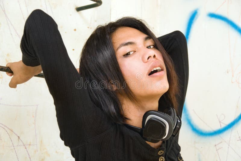 Retrato de cabelos compridos asiático do adolescente imagem de stock