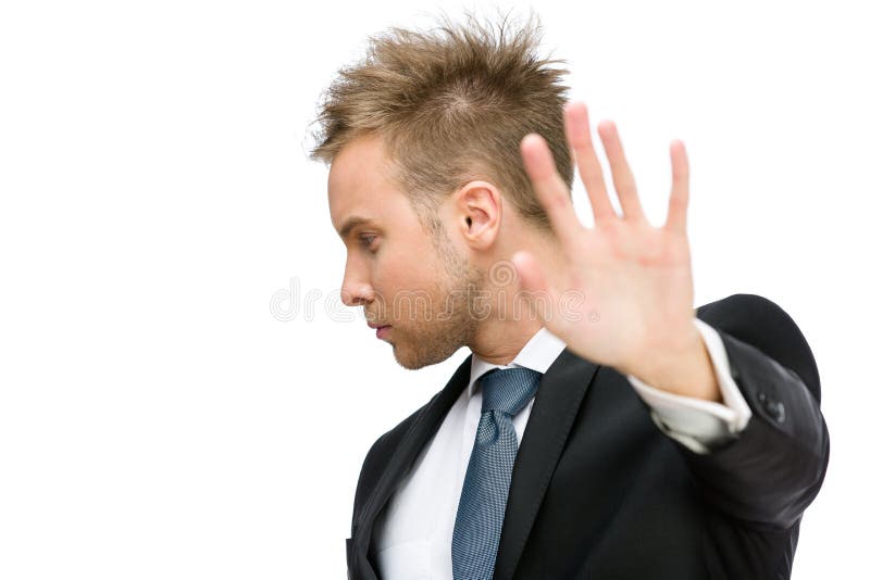 Retrato de gesticular da parada do homem de negócios imagem de stock Retrato de gesticular da parada do homem de negócios imagem de stock