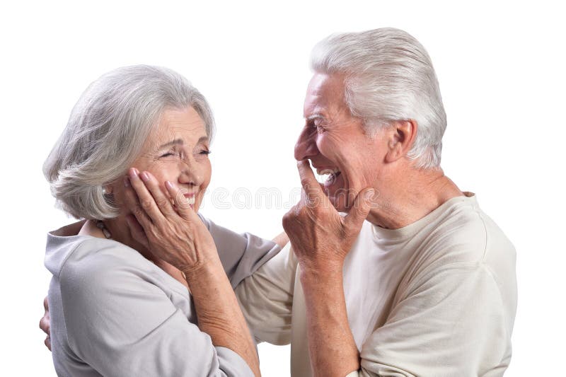 Retrato de pares mayores felices en el fondo blanco imagen de archivo libre de regalías Retrato de pares mayores felices en el fondo blanco imagen de archivo libre de regalías