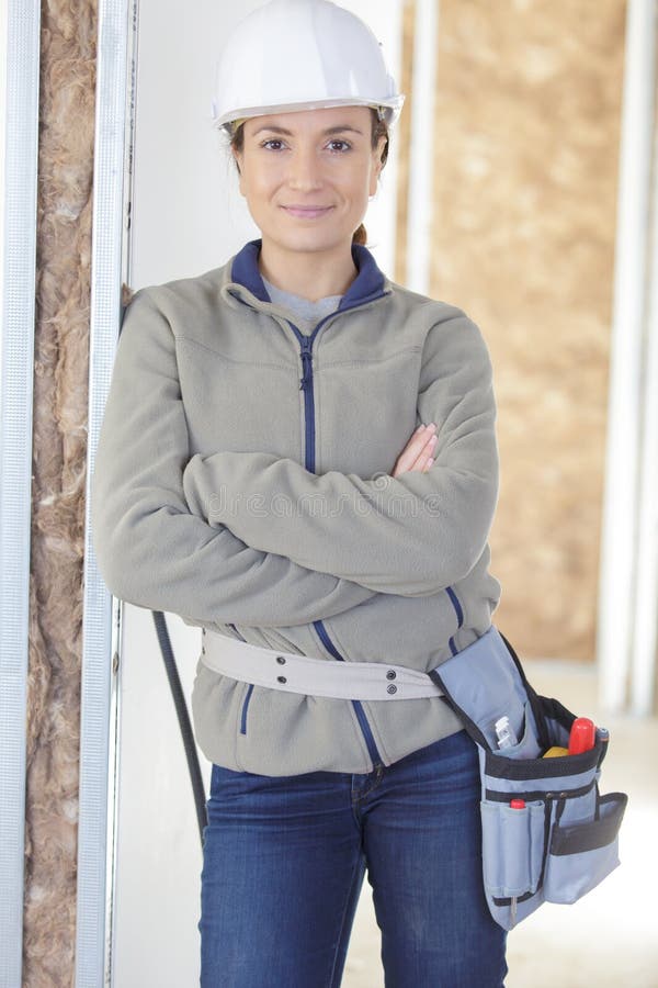 Retrato de trabalhadora trabalhadora da construção imagem de stock royalty free