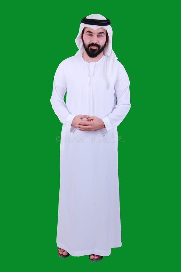 Retrato de um homem árabe seguro que dá boas-vindas e que veste ao vestido tradicional UAE EMIRATI dos UAE SEGURO imagens de stock Retrato de um homem árabe seguro que dá boas-vindas e que veste ao vestido tradicional UAE EMIRATI dos UAE SEGURO imagens de stock