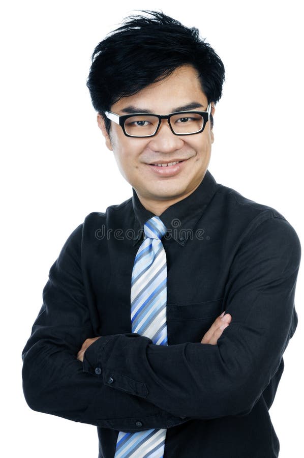 Retrato de um sorriso novo considerável do homem de negócios imagens de stock Retrato de um sorriso novo considerável do homem de negócios imagens de stock