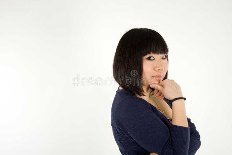 Retrato de uma rapariga coreana bonita fotografia de stock royalty free