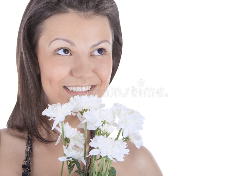 Retrato de uma mulher 'sexy' nova com uma flor branca foto de stock Retrato de uma mulher 'sexy' nova com uma flor branca foto de stock