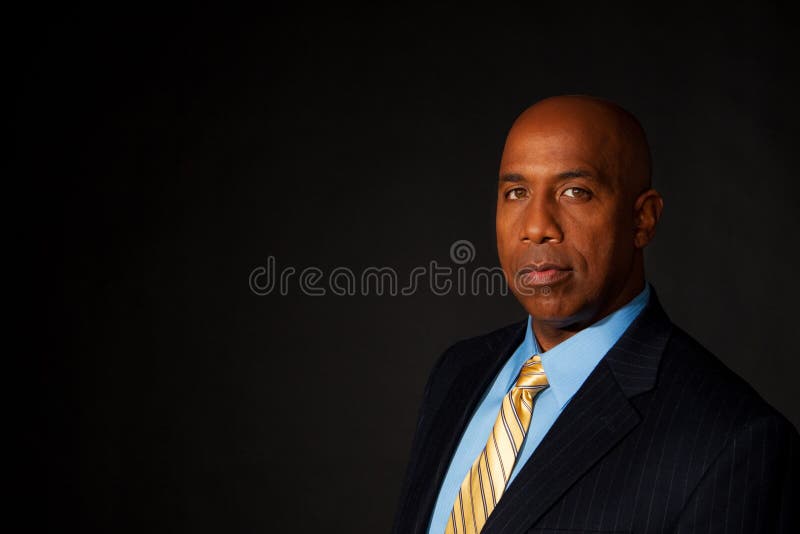 Retrato de un hombre de negocios afroamericano maduro fotografía de archivo libre de regalías Retrato de un hombre de negocios afroamericano maduro fotografía de archivo libre de regalías