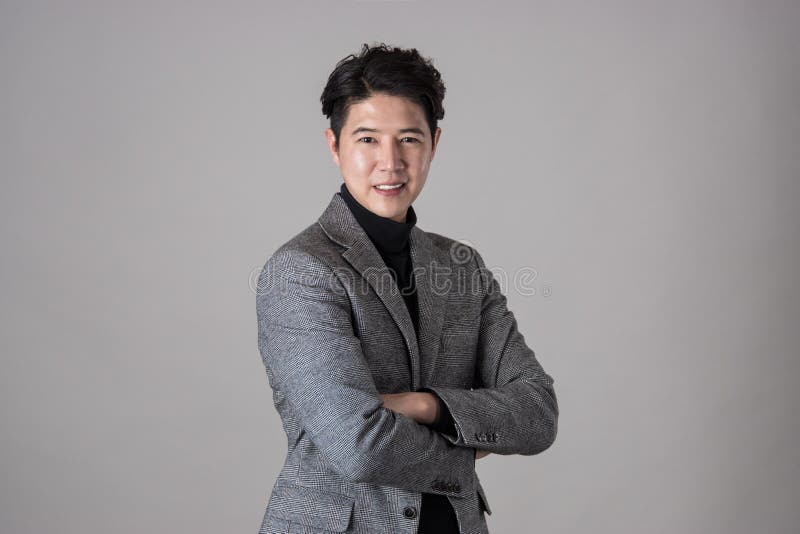Retrato de un hombre de negocios asiático feliz fotos de archivo libres de regalías Retrato de un hombre de negocios asiático feliz fotos de archivo libres de regalías